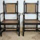 Paire de fauteuils canneés style Louis XIII anciens