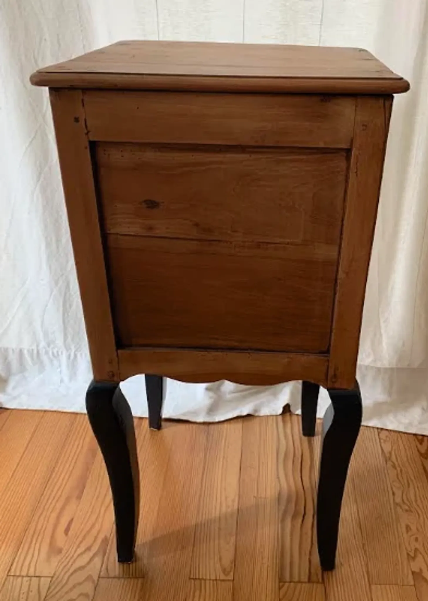 wooden bedside table