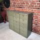 Vintage industrial furniture with metal clamshell atal