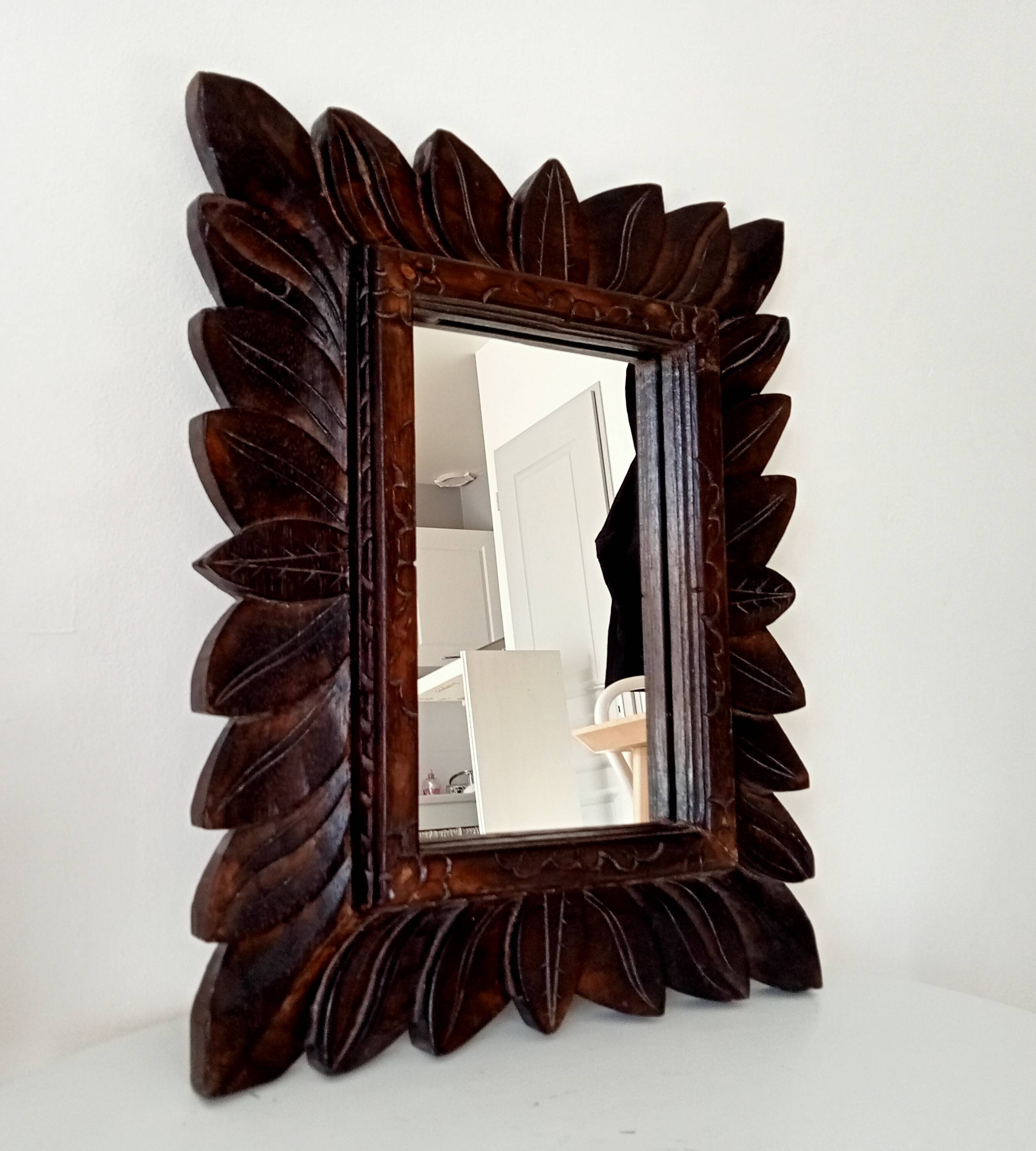 Antique mirror in carved wood