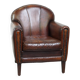 A vintage-style armchair with character, upholstered in beautifully patinated sheepskin.