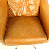 Matador swivel leather chair with ottoman by Aage Christiansen for Erhardsen & Andersen, 1960s