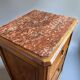 Pair of Art Deco bedside tables from 1930 in carved wood and red marble