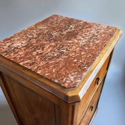 Pair of Art Deco bedside tables from 1930 in carved wood and red marble
