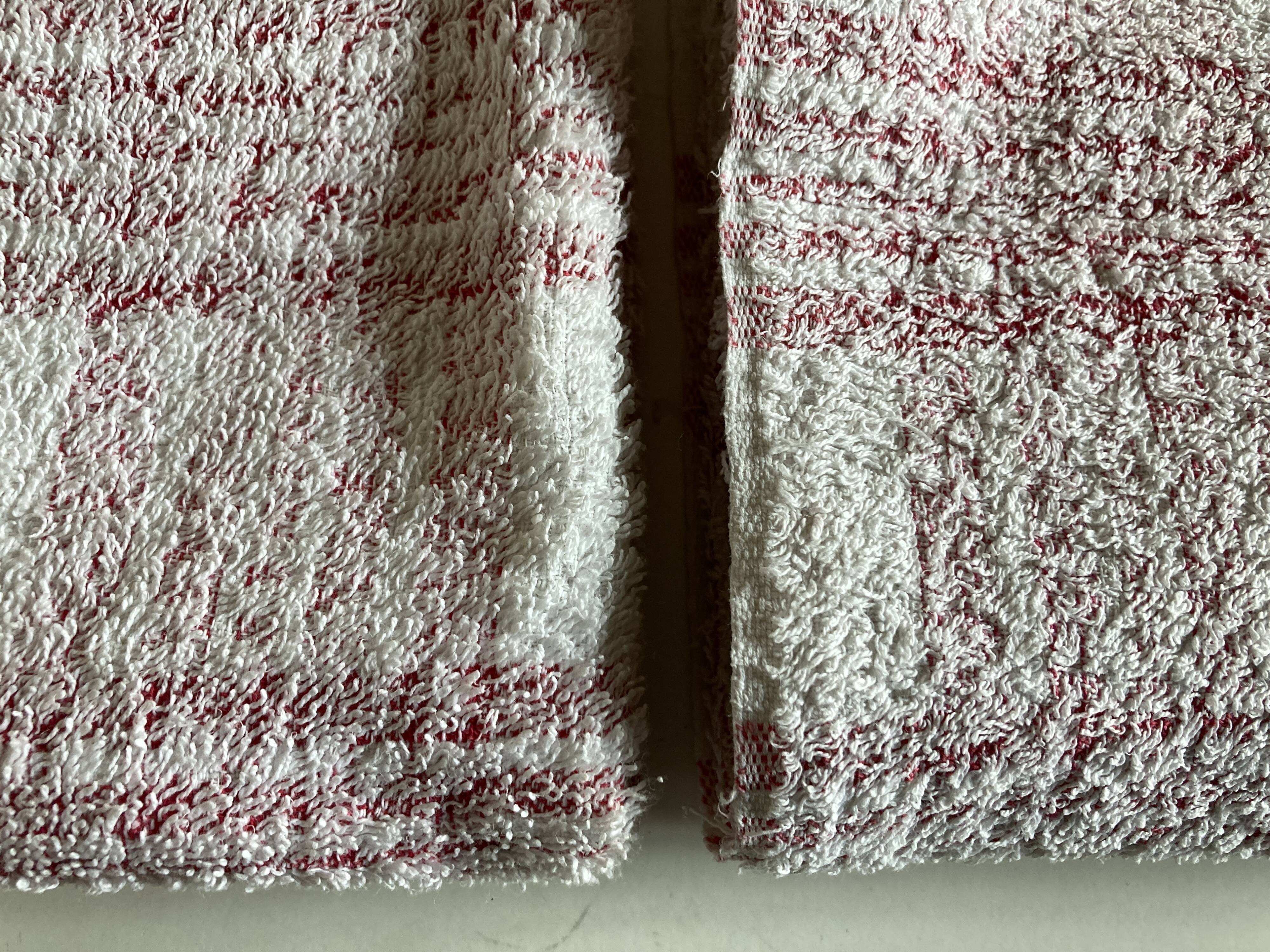 Pair of 1950 red woven kit towels