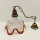 Clear glass chandelier and orange edge