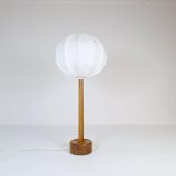 Mid-century solid teak table lamp from the 1960s Sweden.