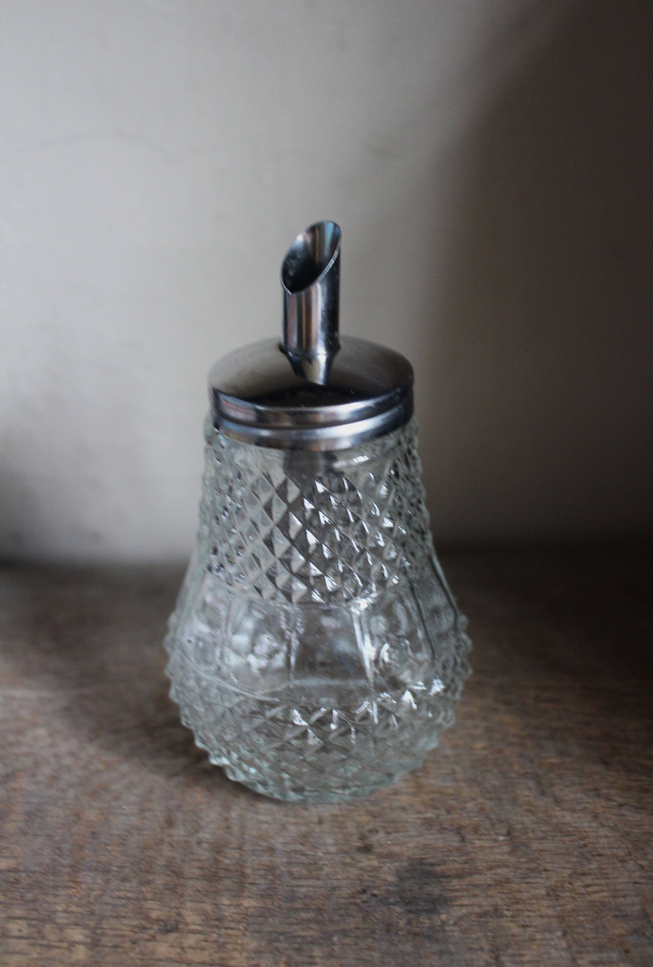 Vintage sugar bowl in chiseled glass Metal pourer