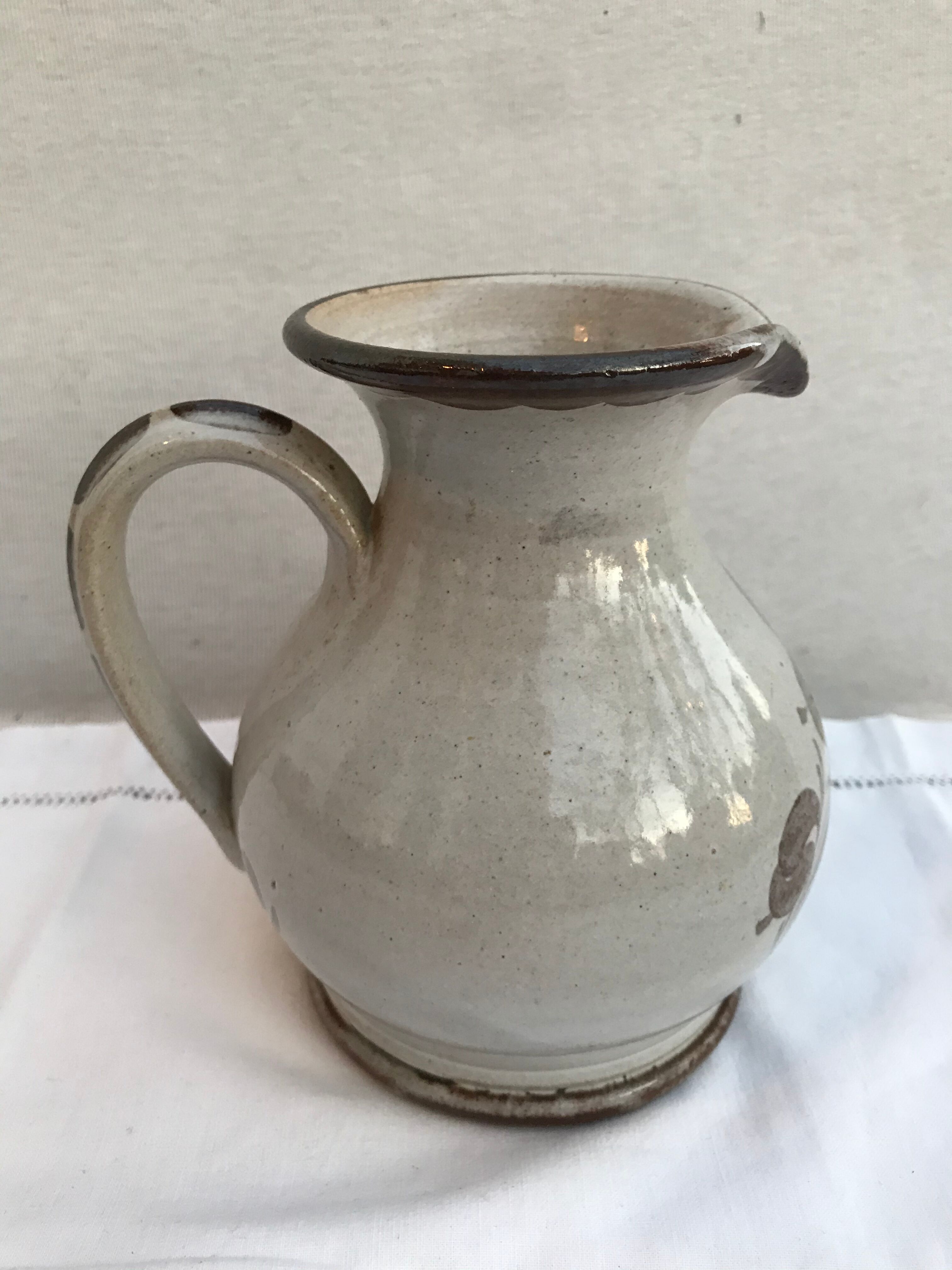 Former pitcher enamelled sandstone