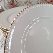 Set of 11 flat plates in porcelain Bavaria beige bordered gold model Jutta
