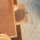 Magazine rack with sliding drawers in light wood, Scandinavian style.