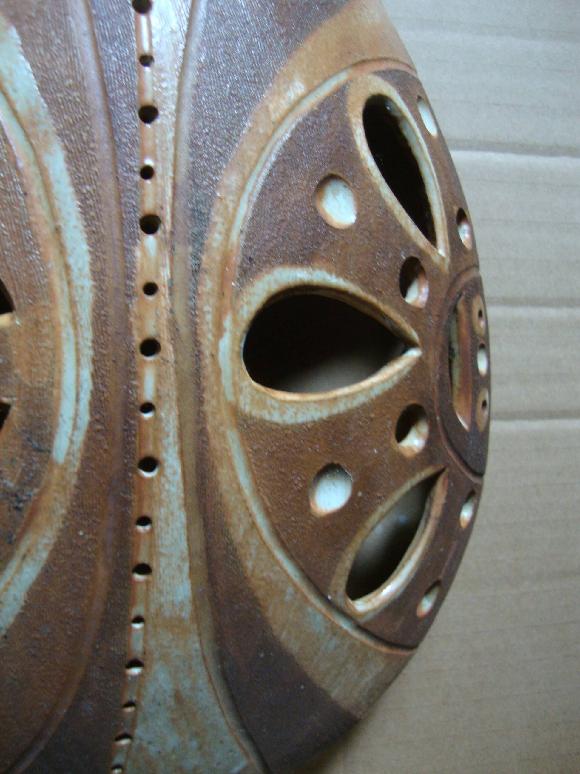 Ethnic ceramic wall lamp signed.