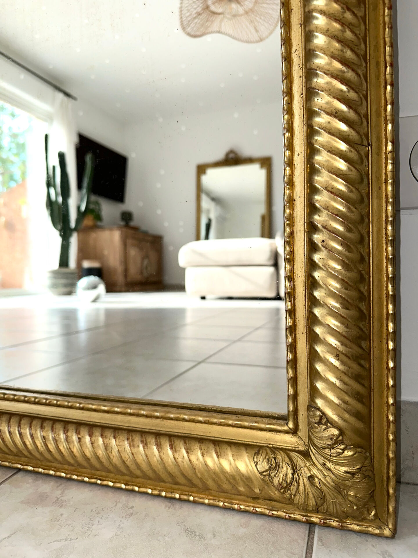 19th-century antique gilded mirror.