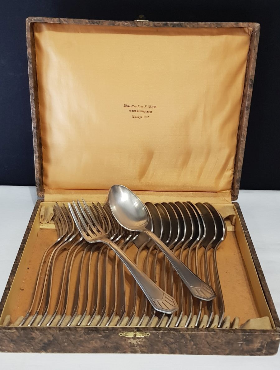 23-piece silver metal art deco cutlery set