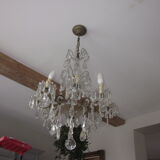 chandelier has antique pendants