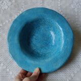 Empty turquoise raku pocket