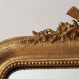 Old gilded mirror with A pediment
