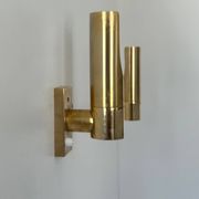 Pair of vintage adjustable brass wall lights, France 1970.