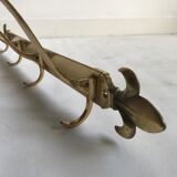 Golden brass wall rack