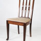 Ensemble de quatre chaises de salle à manger en palissandre et rembourré avec du tissu léger, années 1920