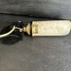 Old black metal and brass wall light, adjustable, 1930s.
