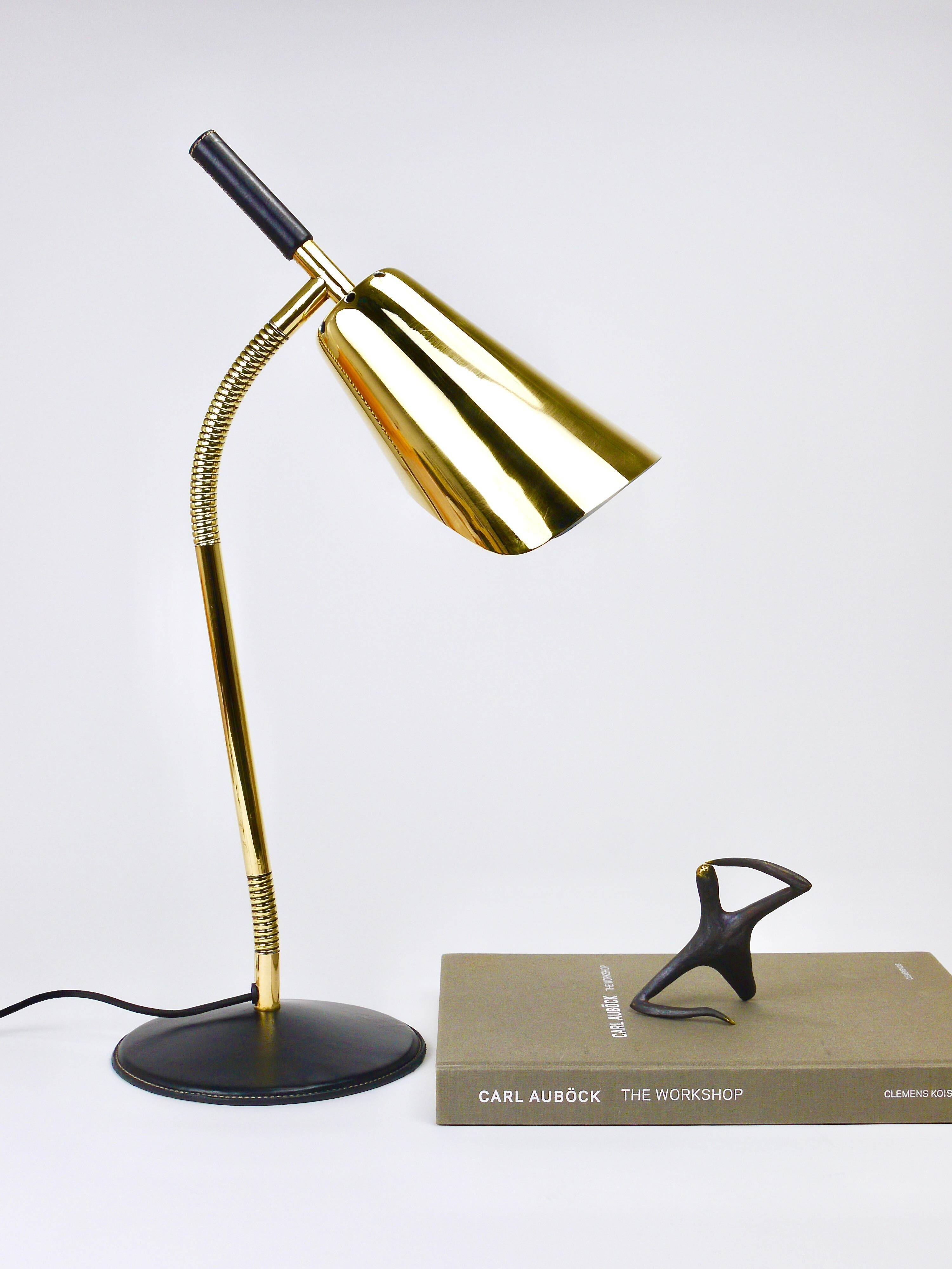 Rare desk and table lamp in brass and leather by Carl Aubock II #4280, Vienna, Austria.