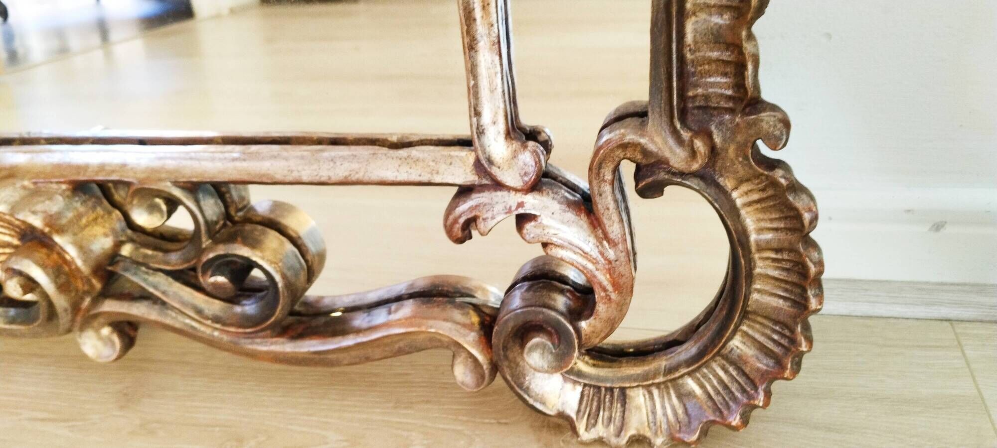 Antique mirror with rococo-style pareclose, in gilded wood, 19th century
