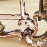 Antique mirror with rococo-style pareclose, in gilded wood, 19th century