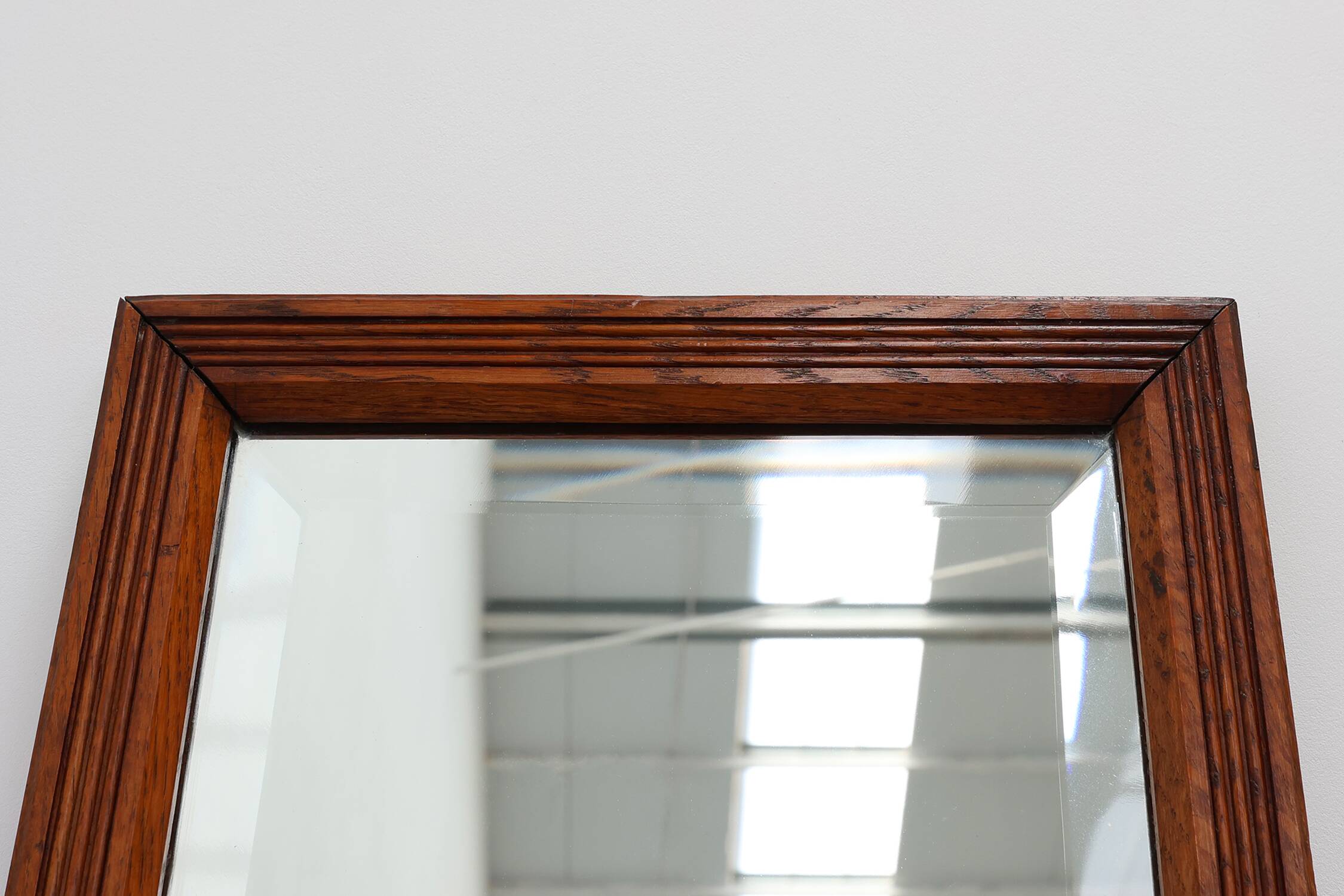 French art deco mirror with carved oak wooden frame, ca. 1930