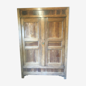 Front of old double door walnut cabinet