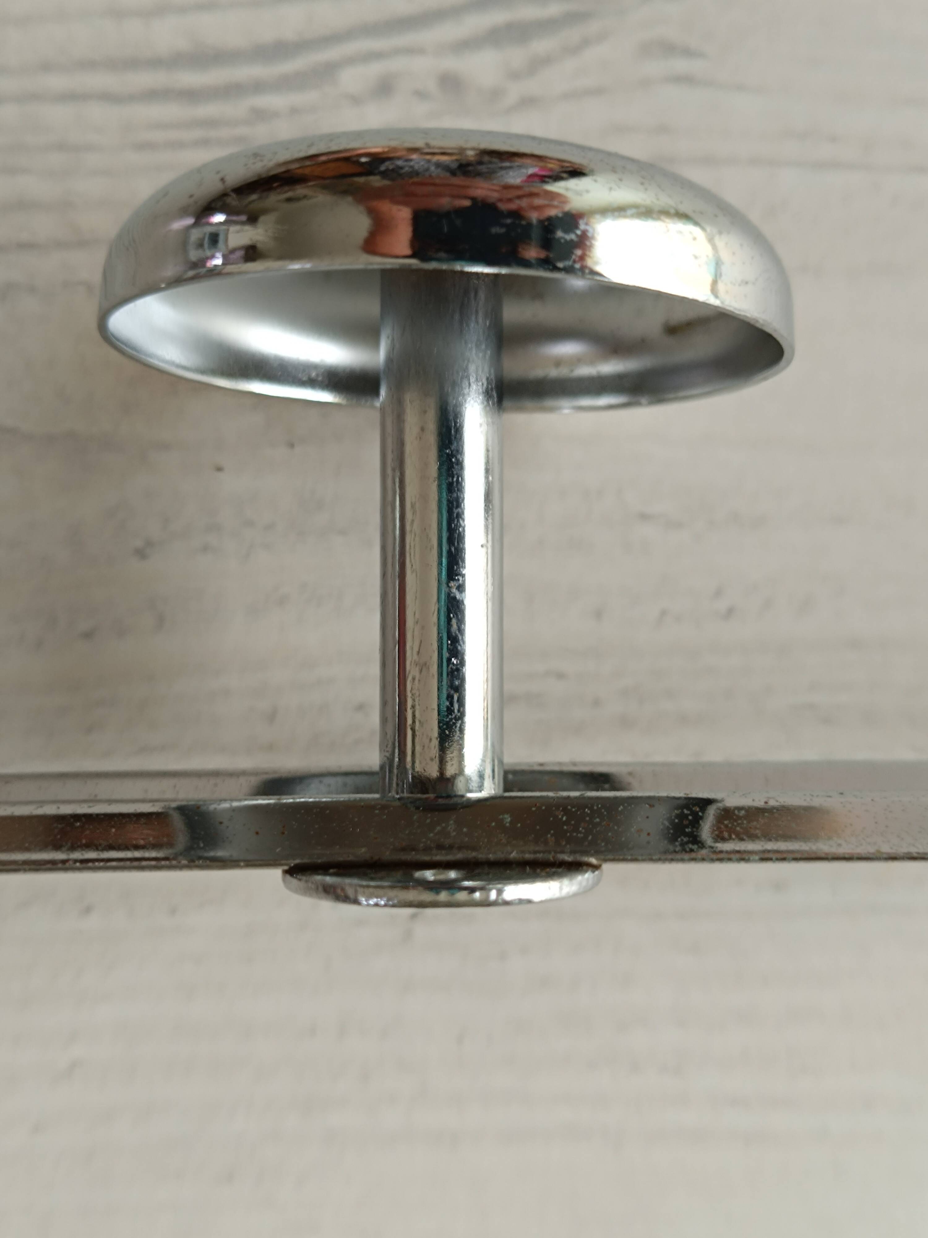 Chrome metal wall coat rack