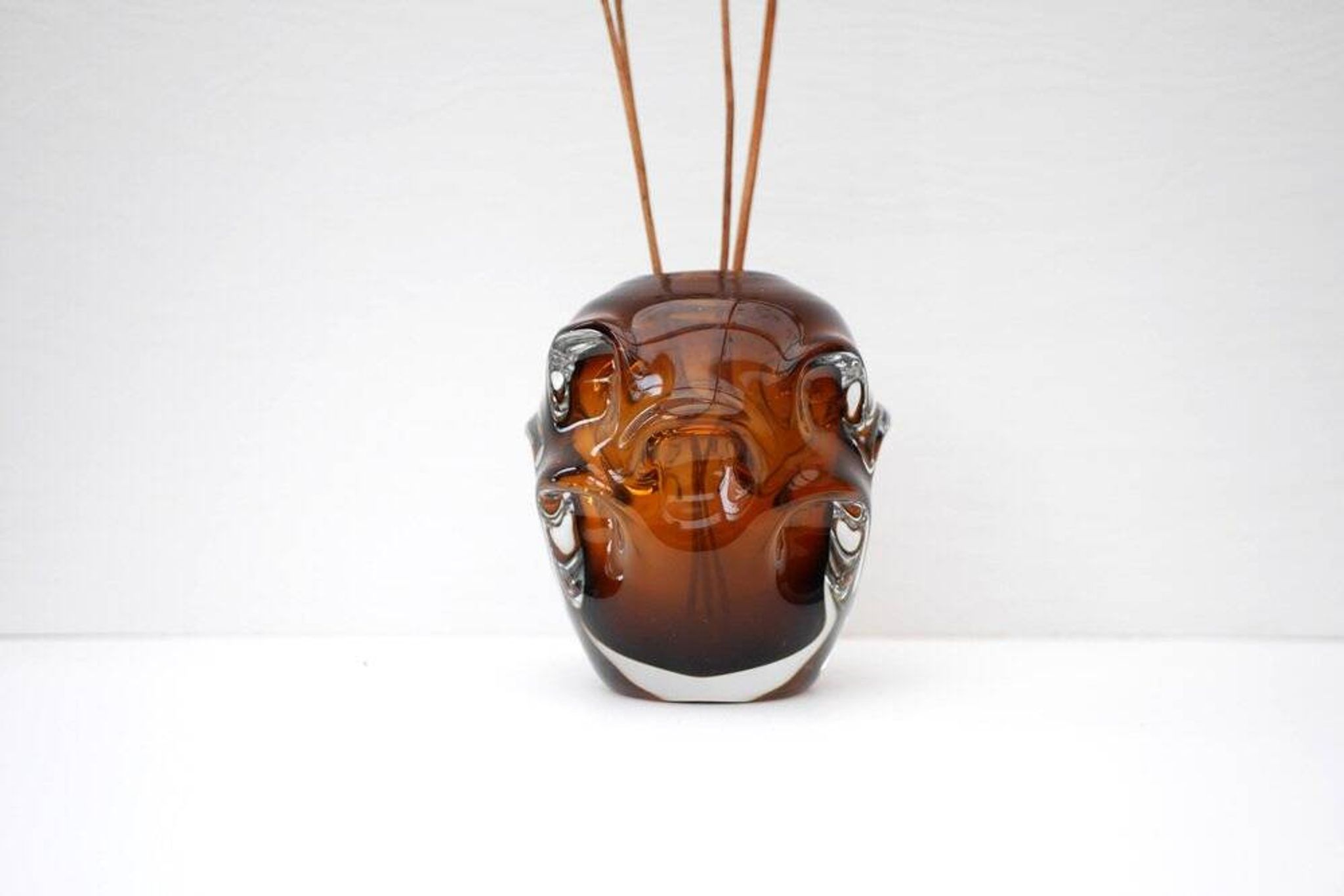Mid-century modern biomorphic-shaped handmade crystal vase in amber and brown attributed to Börne Augustsson for Åseda, Sweden