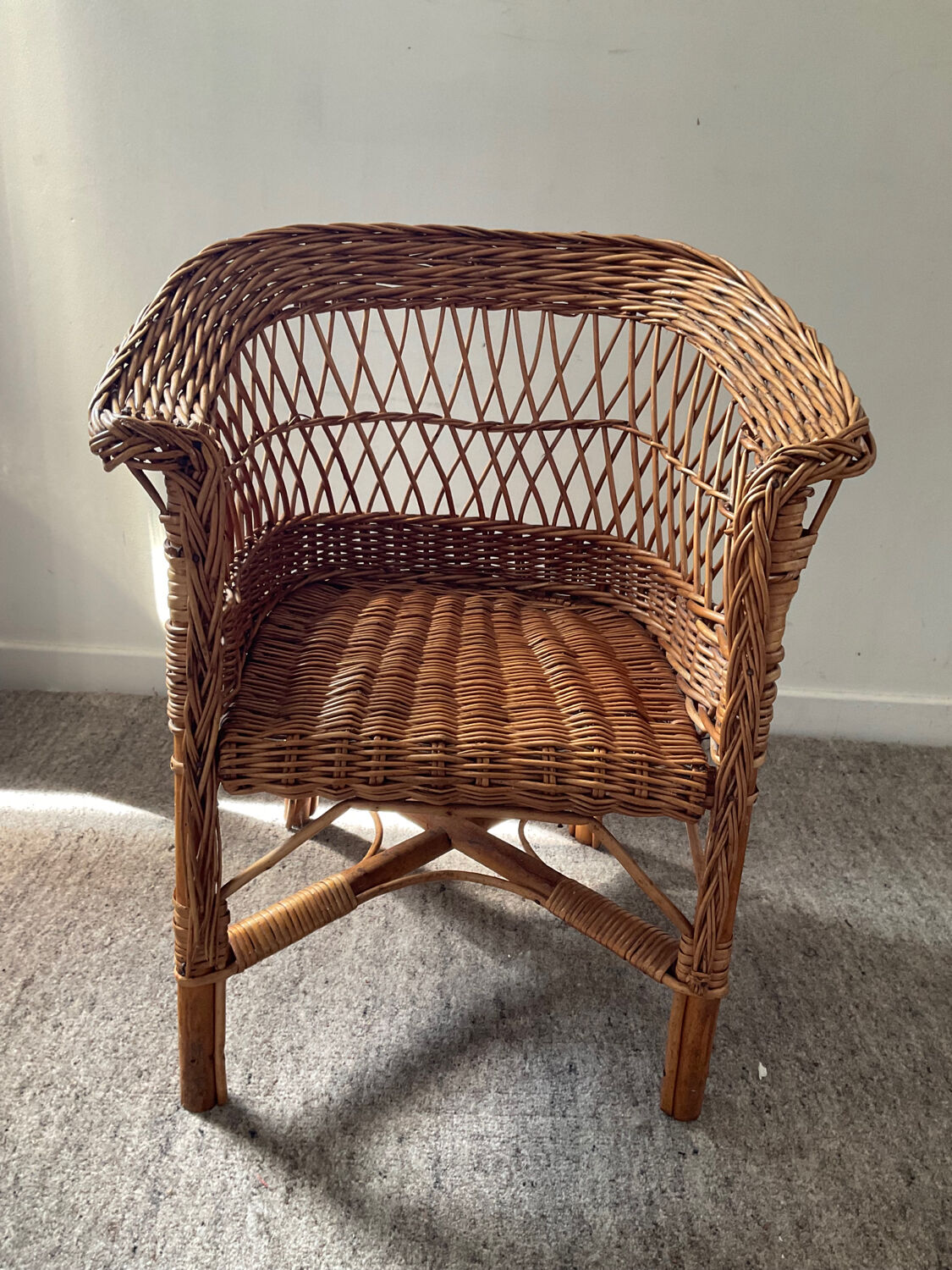 Vintage wicker children's armchair