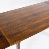 Dining table in rosewood with extensions from the 1960s