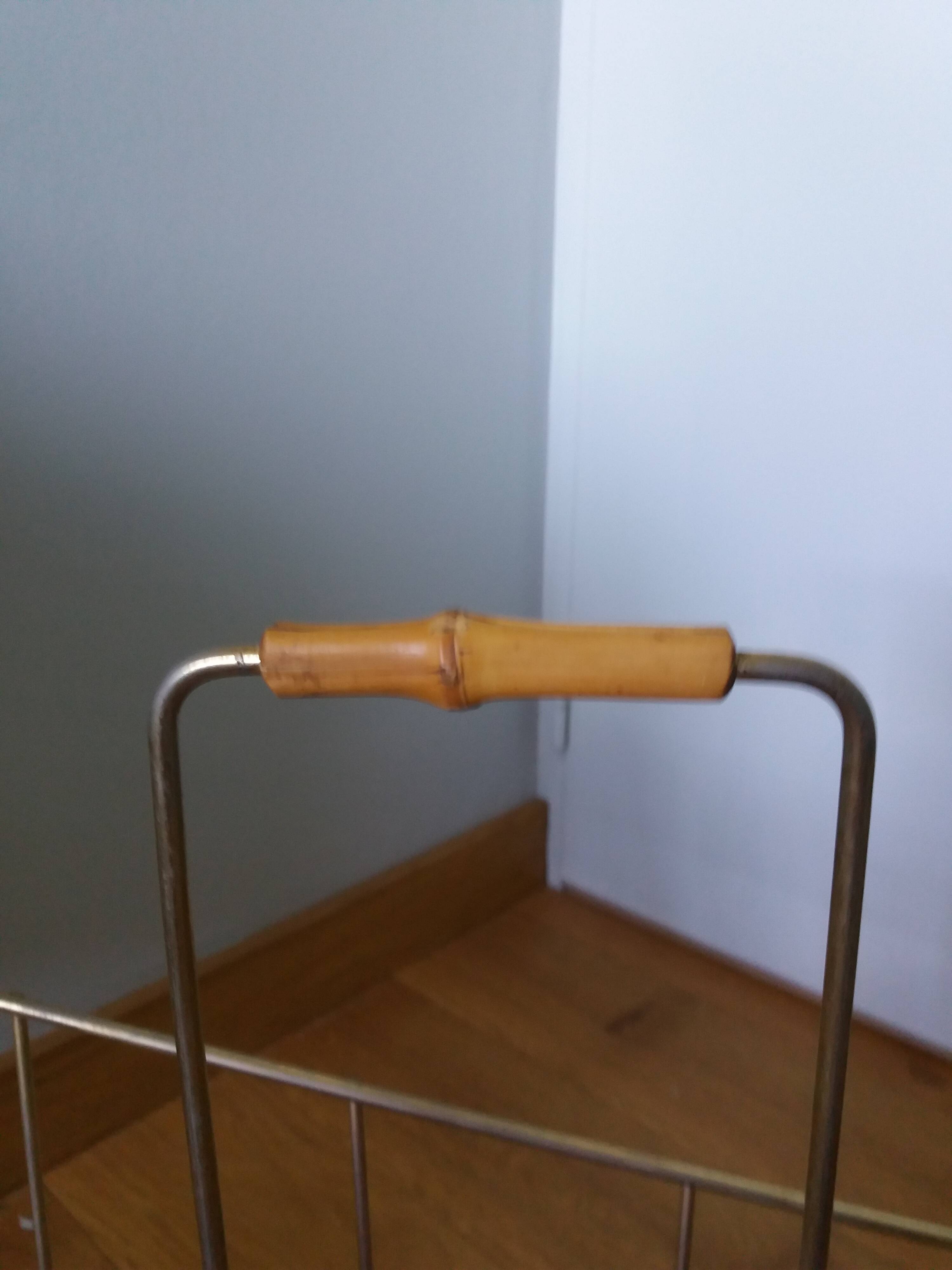 Gold metal magazine rack