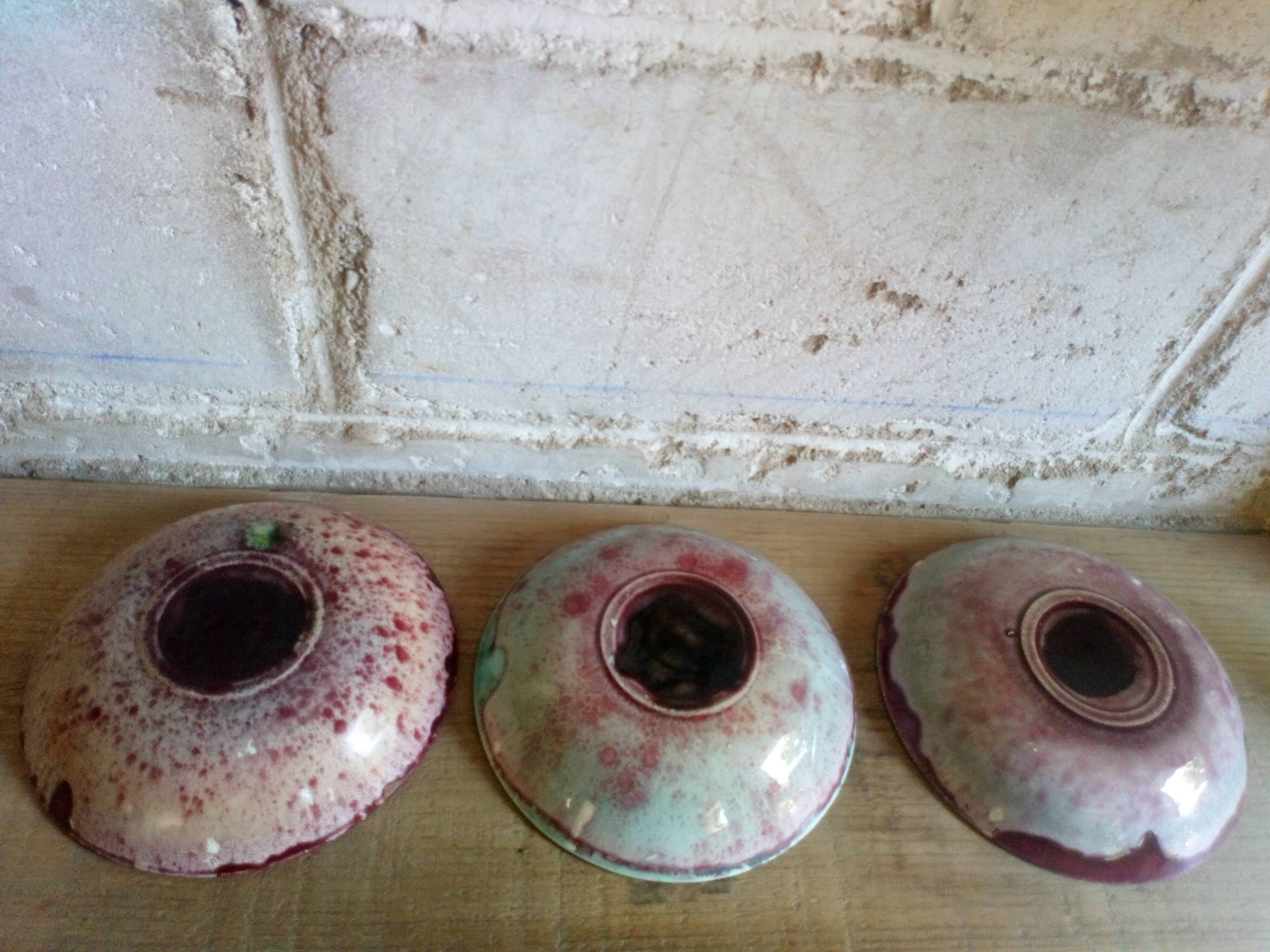 Seven plates of potter with multicolored enamels
