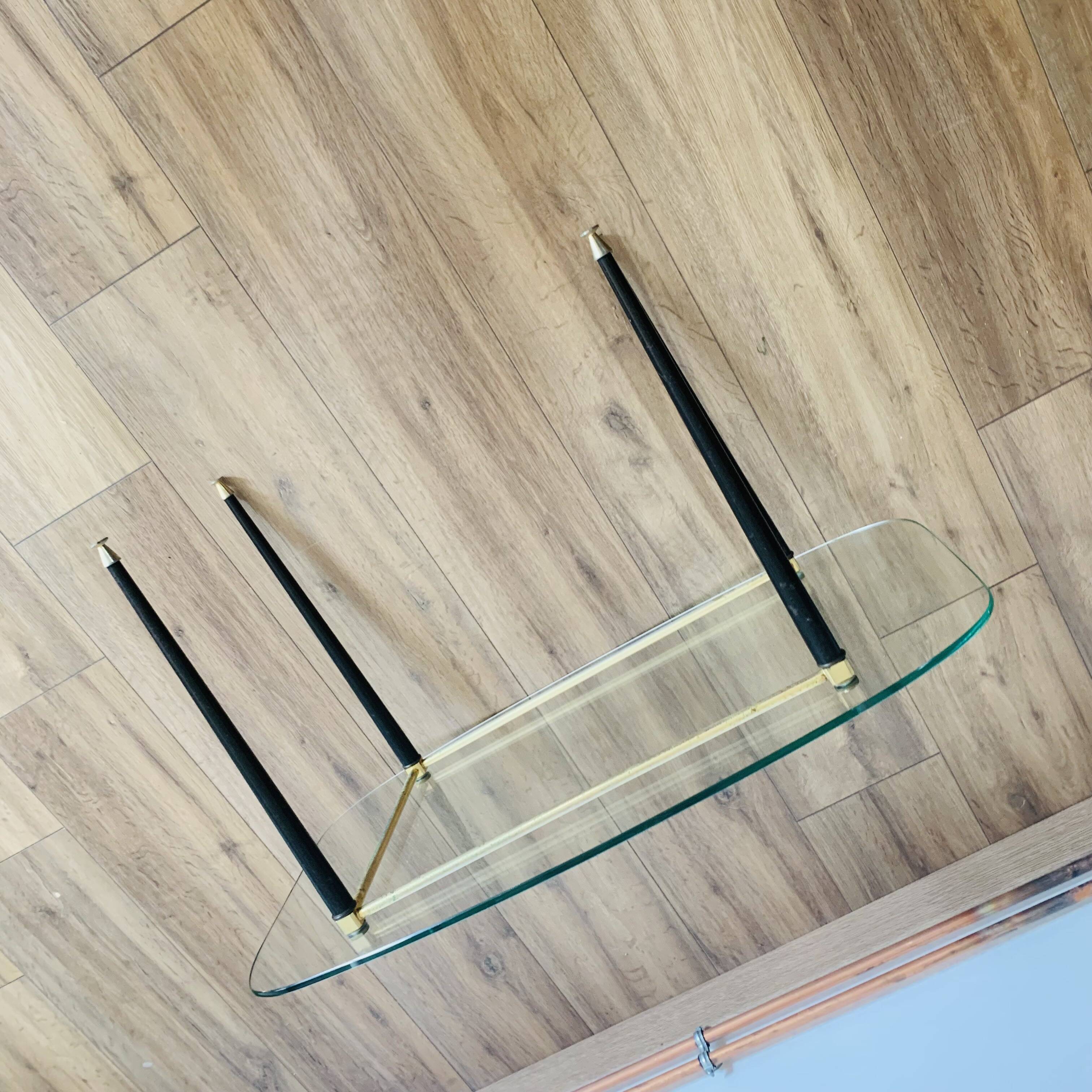 Coffee table from the 50s/60s, glass, brass, black metal.