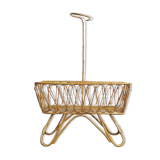 Baby cradle in vintage rattan
