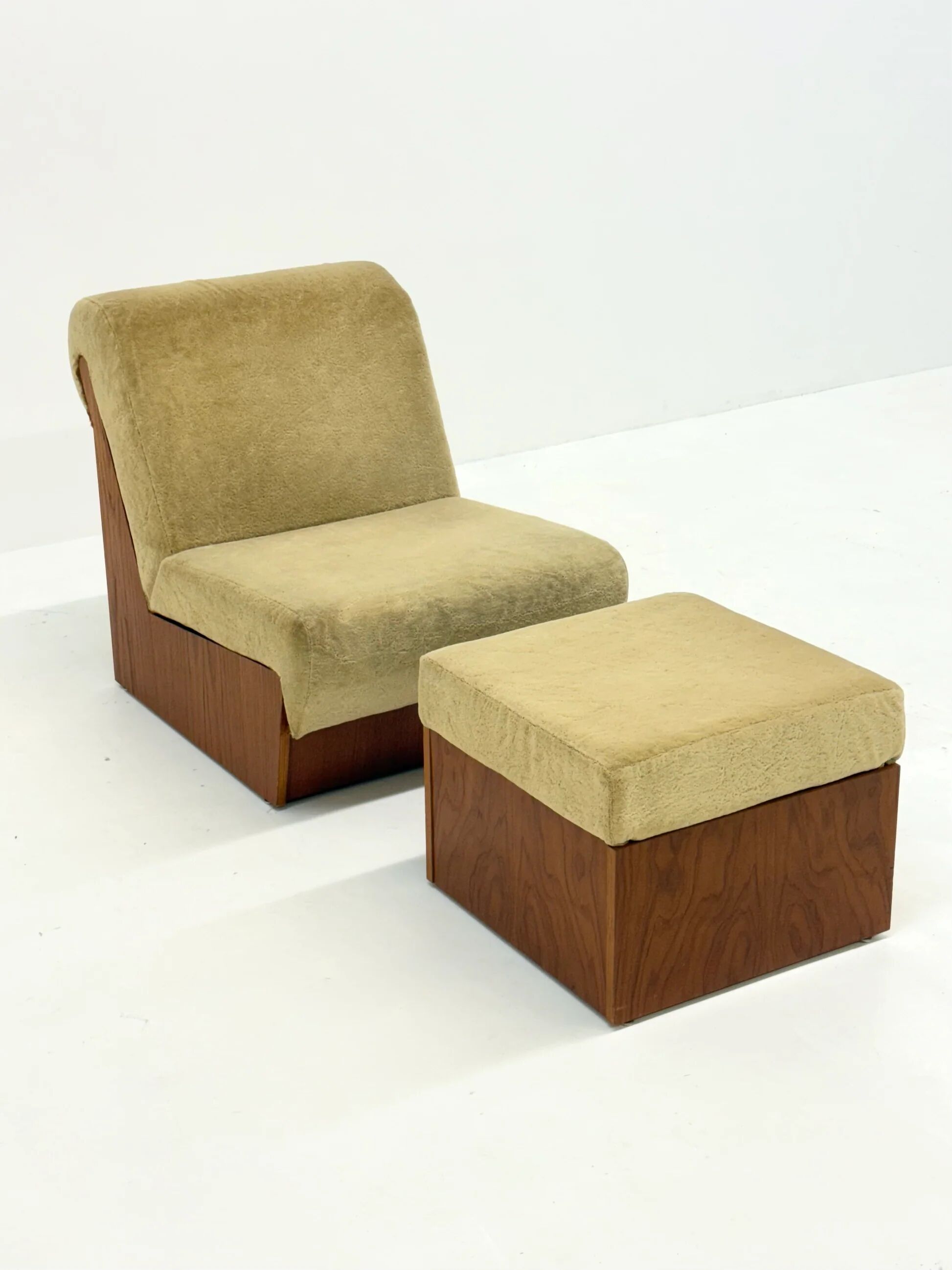 Vintage mid-century beige armchair with wooden frame and ottoman