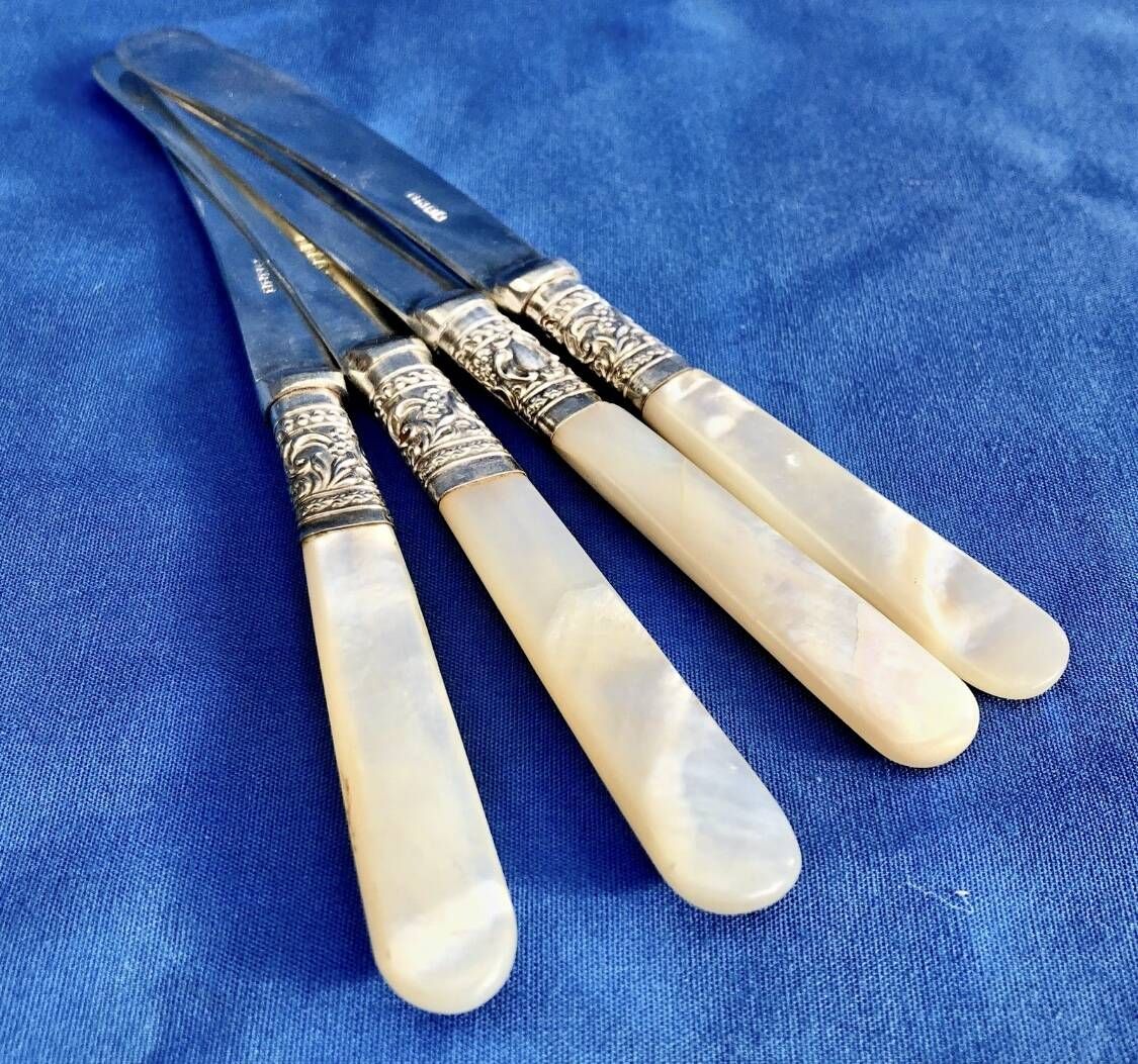 4 antique butter spreading knives in silver-plated metal and mother-of-pearl.