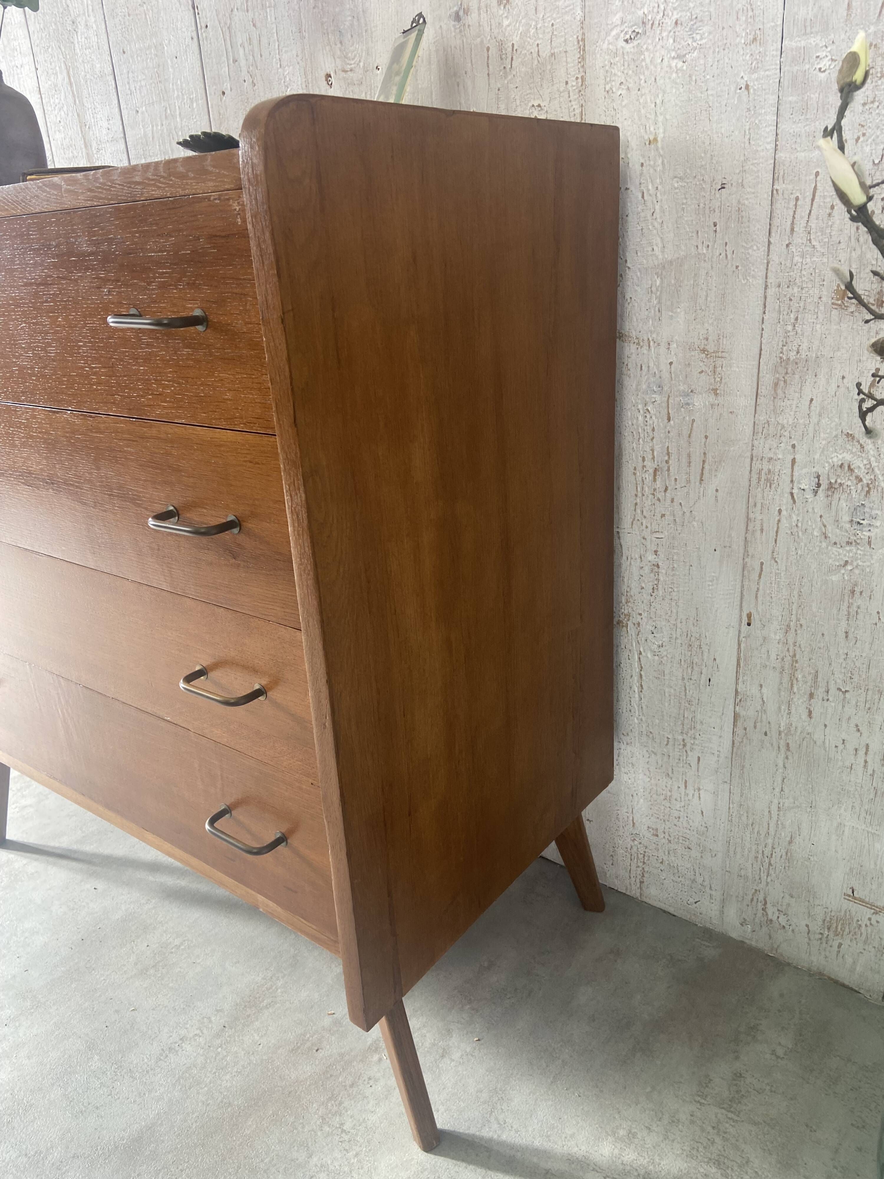 Vintage chest of drawers with tapered legs