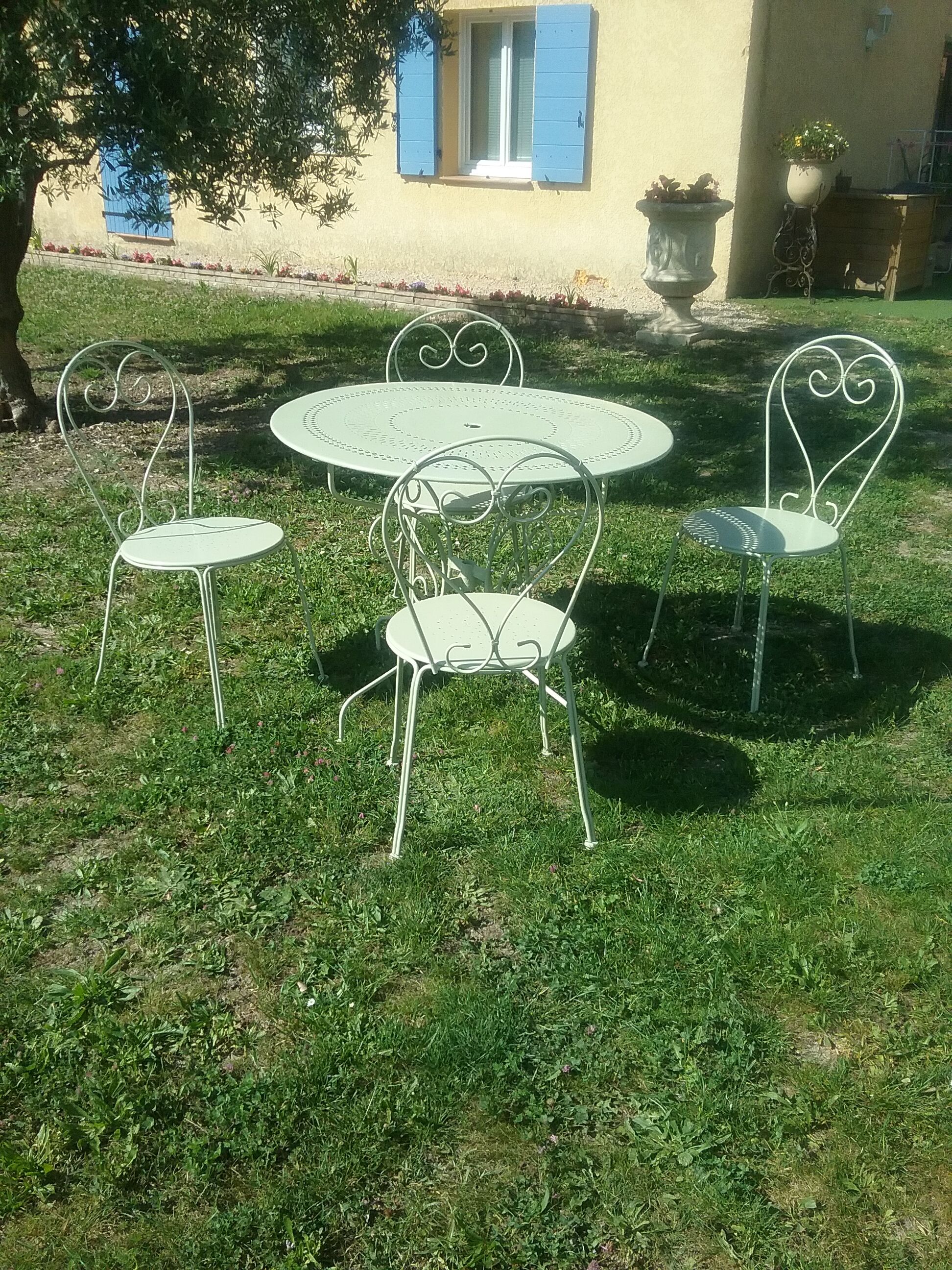 Green wrought iron garden furniture