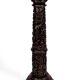 Important high Asian column / saddle in carved wood, circa 1880, Indochina