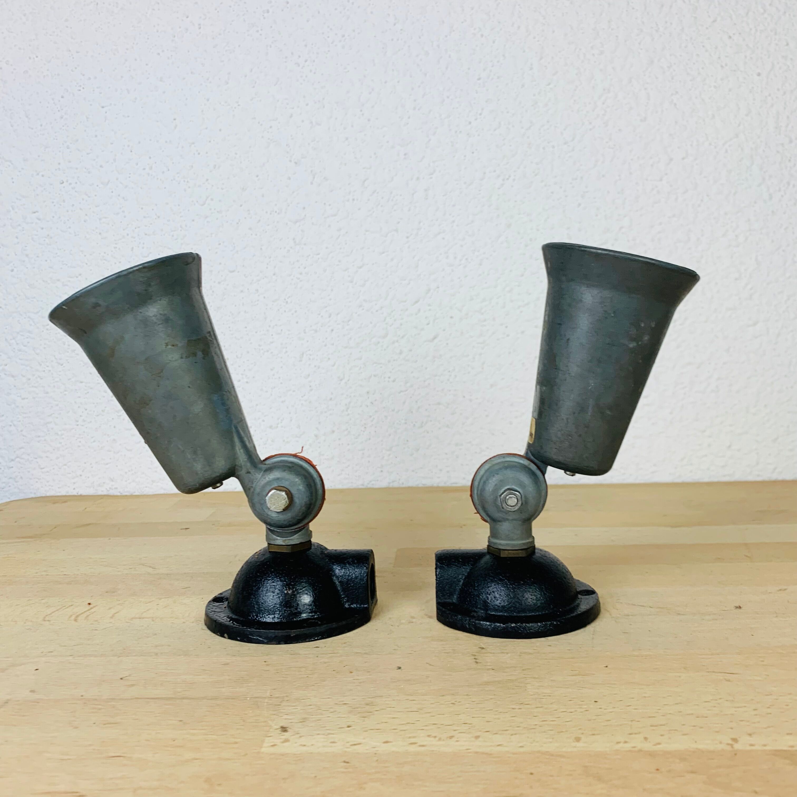 Pair of industrial metal spot wall lights in loft style.