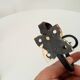 Pair of antique wrought iron coat hooks