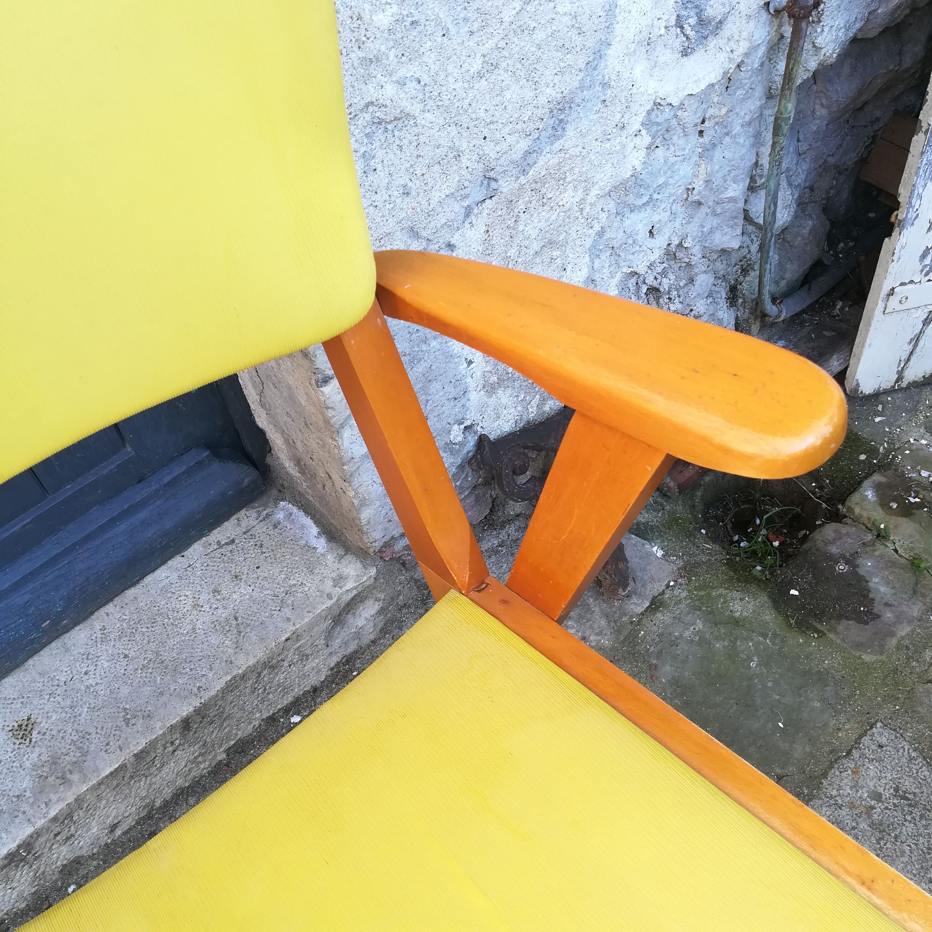 Chair wood and yellow vinyl
