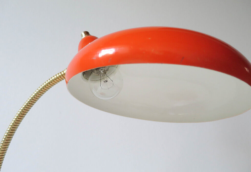 Orange flexible desk lamp