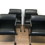 Suite of 4 armchairs in leather and black lacquered metal Rosenthal