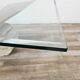 Valentino coffee table by Cattelan Italia in glass, wood, and travertine