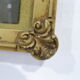 Former Art Deco photo frame with children's photo and wooden horse